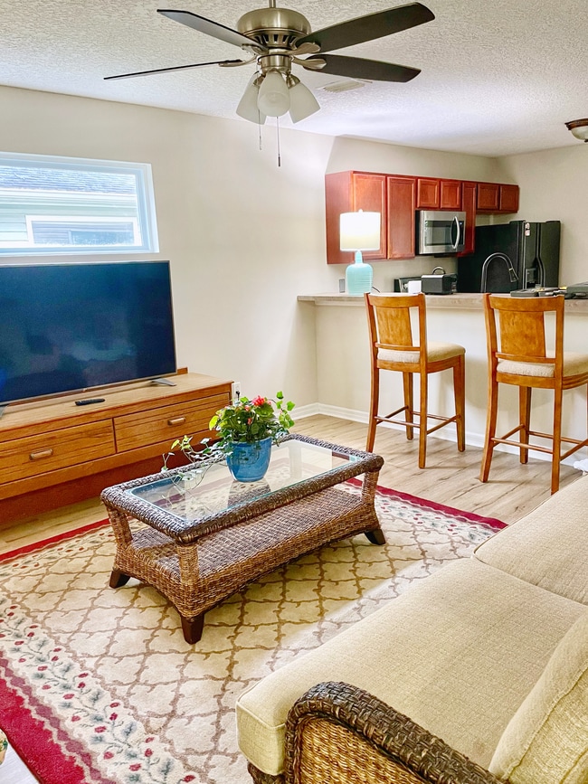 Large TV and comfy furniture make the Living Room - 1535 N Whitney St