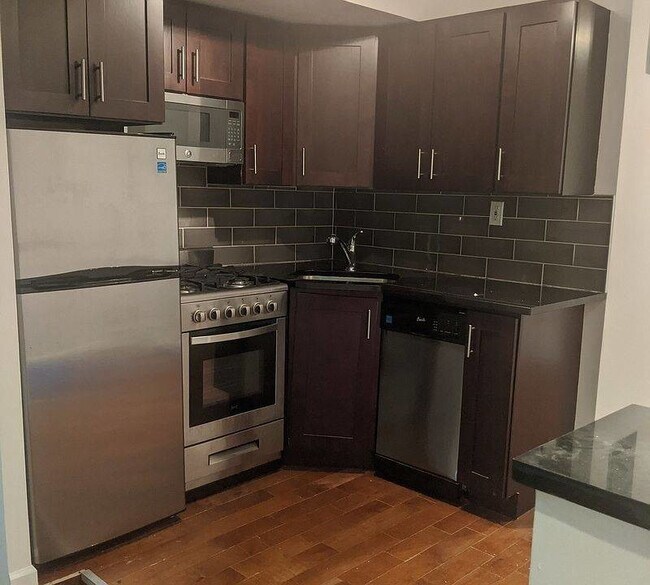 Building Photo - 2166 Frederick Douglass Blvd #2f