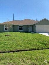 Building Photo - 1726 SE Minorca Ave