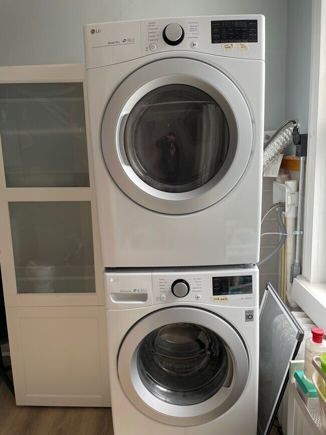 New, full-sized LG washer/dryer in bathroom - 1204 John St