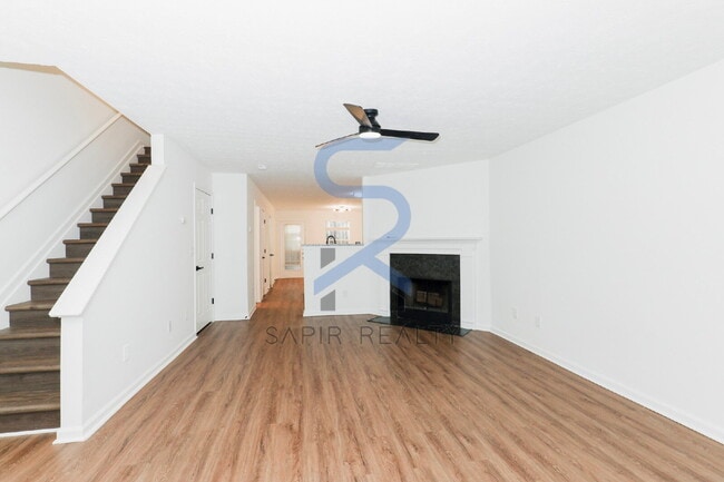 Building Photo - Move in before February 28th and choose your reward: a $250 Amazon Gift Card or a 55" Smart TV!