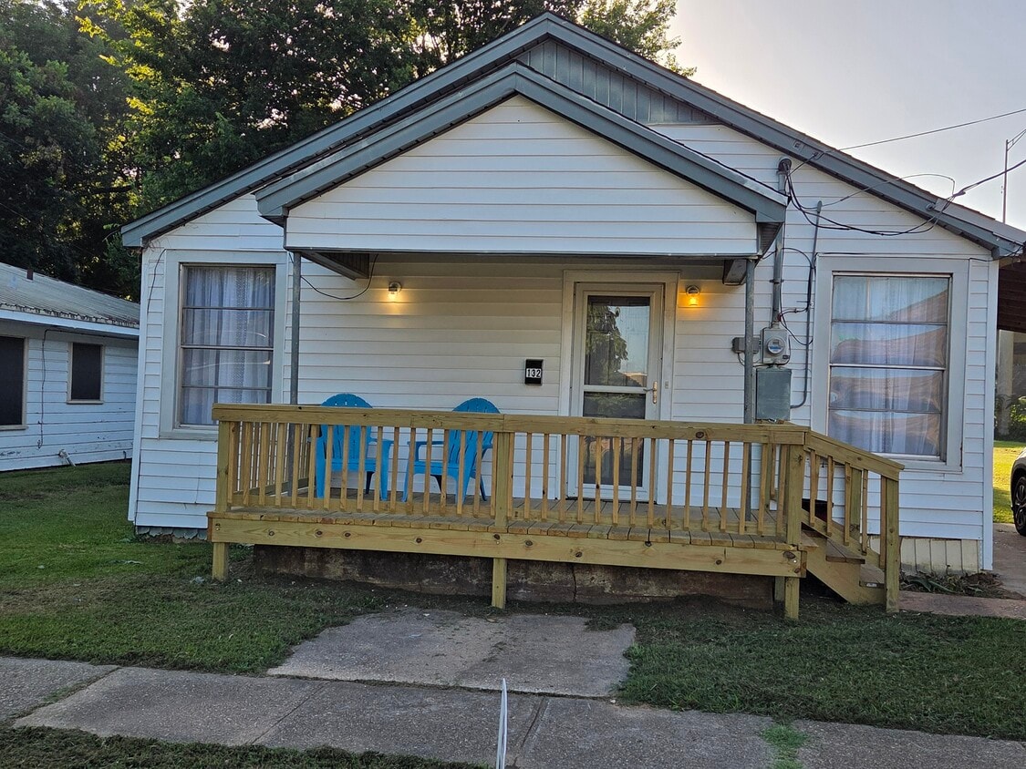 A large front porch was added to create a family friendly outdoor gathering space. - 132 Westerfield St