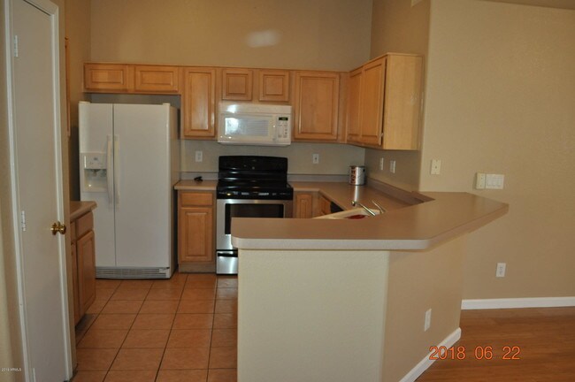 Building Photo - 8544 W Cherry Hills Dr