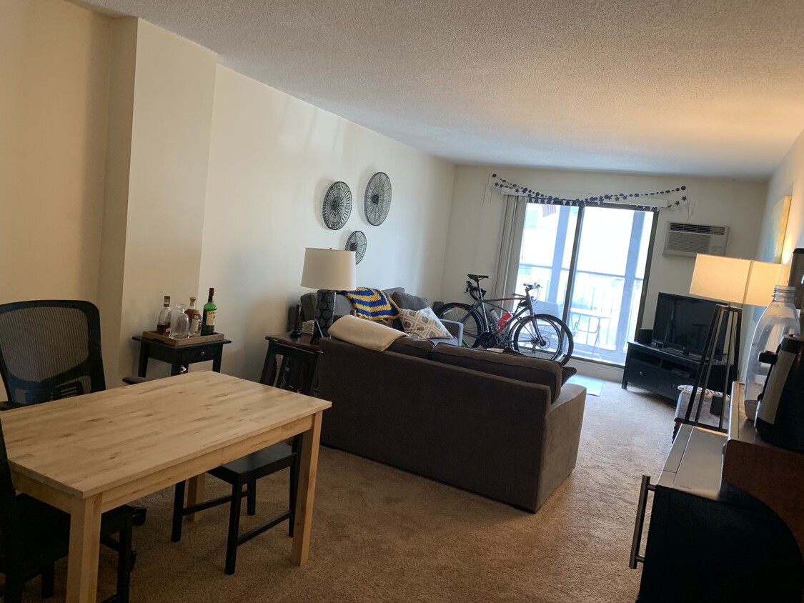 Living Room with Sliders to Balcony - 2353 Massachusetts Ave