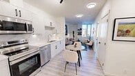 Located on the 7th floor at 529 3 Ave SW in the heart of downtown Calgary, this thoughtfully designed one-bedroom, one-bathroom unit offers a clean, modern aesthetic throughout. The open-concept kitchen and living area maximizes the efficient layout, with the kitchen showcasing white cabinetry with matte black hardware, marble-style backsplash, quartz countertops, and a full suite of stainless steel Samsung appliances including a French door refrigerator, electric range, over-the-range microwave, and dishwasher. Light wood-look flooring runs continuously throughout, enhancing the bright, airy feel of the space. The living area offers comfortable room for both a dining set and lounge seating, with a large window framing views of the Calgary skyline, allowing generous natural light to fill the room. The bedroom is a well-proportioned retreat featuring its own large window with city views and an open closet area providing practical storage. The bathroom is finished in a crisp, all-white palette with a soaker tub-shower combination, vanity with quartz countertop, and tile surround. This unit combines functional urban living with contemporary finishes in a prime downtown location.