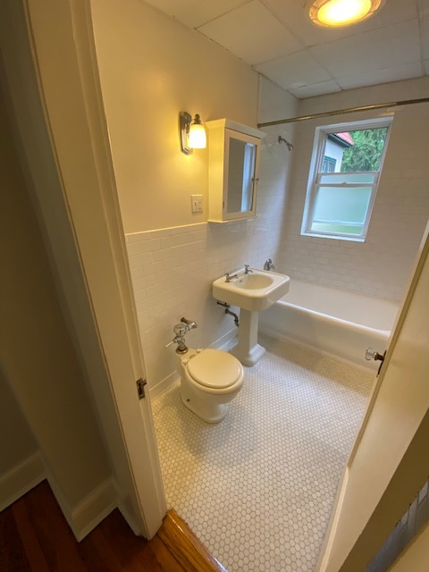 Tile bathroom with tub and shower - 73 Prospect St
