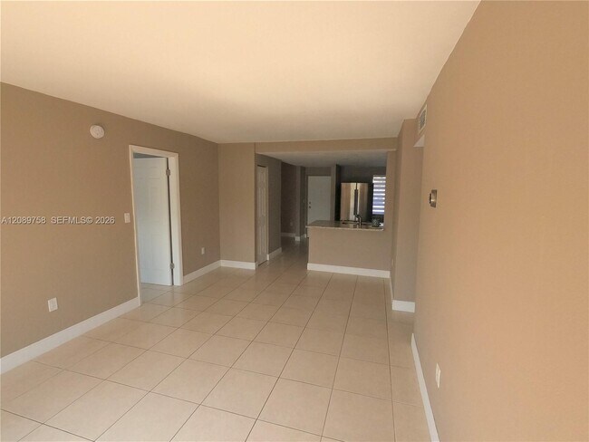 Building Photo - 9911 W Okeechobee Rd
