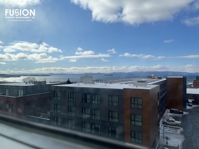 Building Photo - STUNNING LAKE VIEWS - Modern 2BR/2BA Corner Unit in The Vermont House