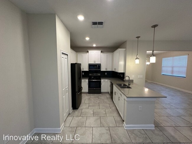Building Photo - 4 br, 3.5 bath House - 11540 Whistling Pin...