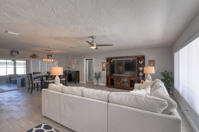 Living Room with Large Couch + Television - 5191 41st St S