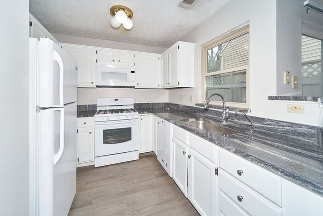 Photo - Updated Ranch with Deck in Pike Twp House