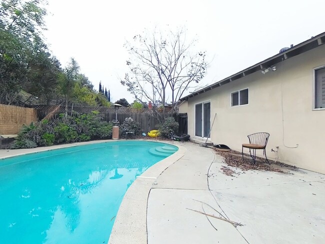 Building Photo - RARELY AVAILABLE- Your Campanile Oasis awaits!  POOL
