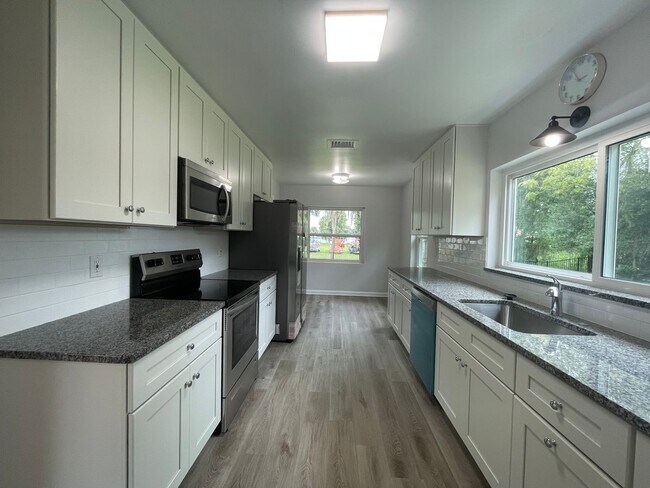 Building Photo - Upgraded 3 BR, 2 BA Single Family Home Ove...