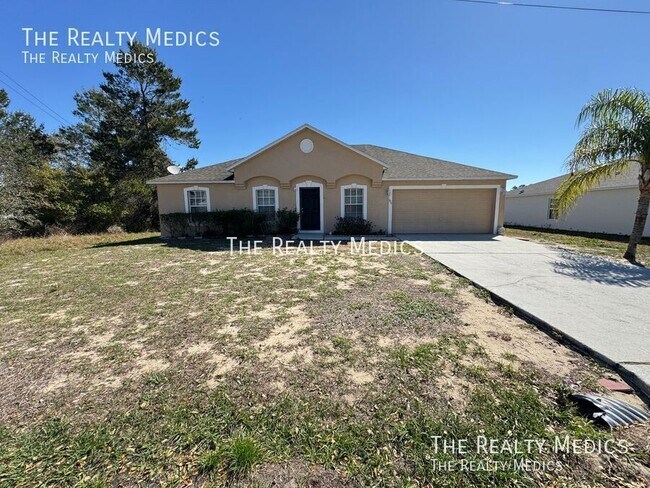 Building Photo - Charming 3-Bedroom Home in Poinciana – You...