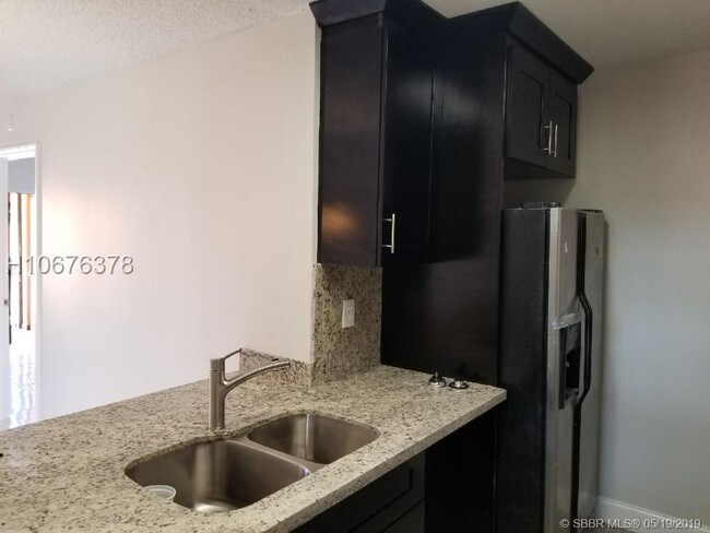 Building Photo - 6425 W 27th Ct
