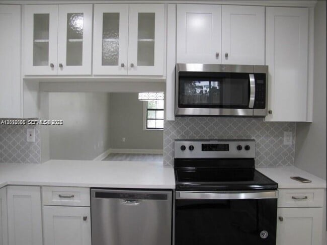Building Photo - 9894 Hammocks Blvd