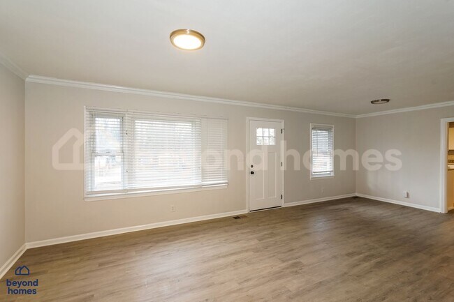 Building Photo - Updated Home with Fenced Yard + Bonus Room - Ready for Move-In Day!