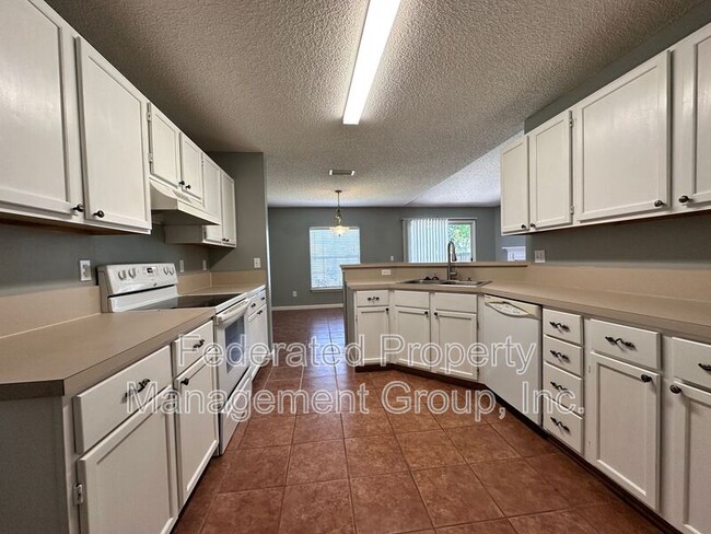 Building Photo - 9007 Bridgecreek Dr W