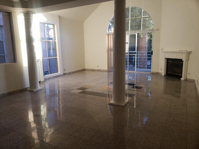 Living and Dining Area w FP - 635 Huntley Dr