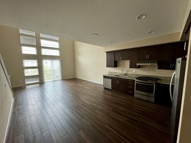 Kitchen and living room - 1504 W Artesia Sq