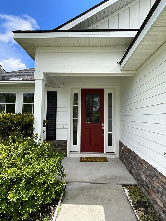 Building Photo - "Spacious 4-Bed Oasis with Stunning Lake V...