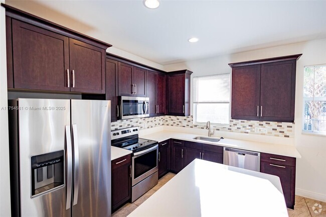 Building Photo - 6950 Pines Cir