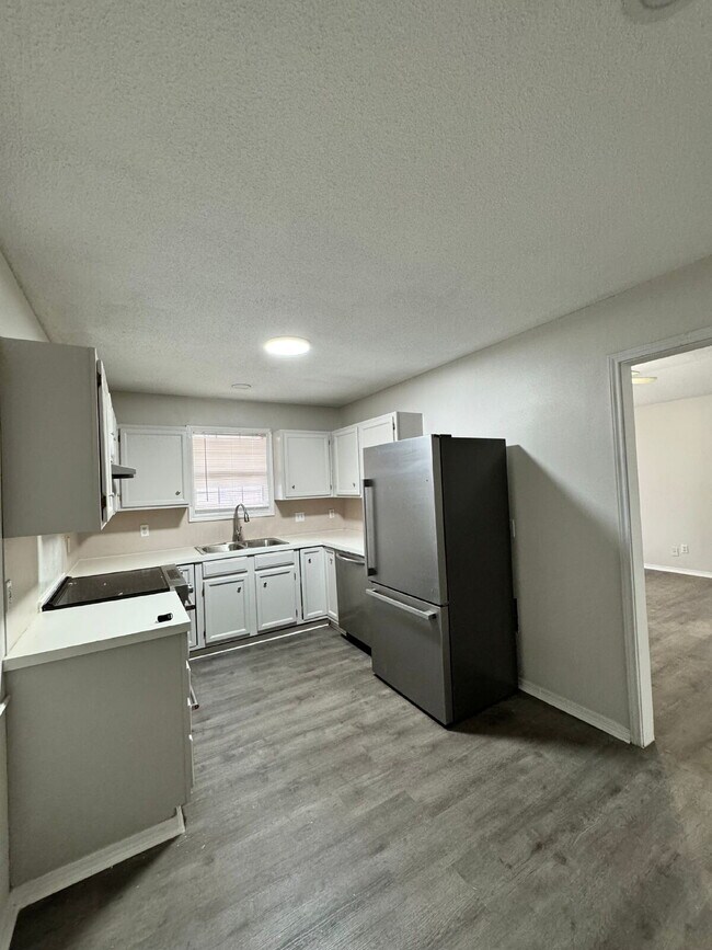 Foto del edificio - "Charming Lubbock Home: 3-Bedroom, 2-Bath Sanctuary with 1157 Sq Ft of Comfort!"