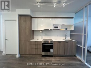 Building Photo - 159 Wellesley St E