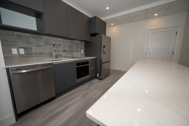 Photo du bâtiment - Beautiful New 1 Bed