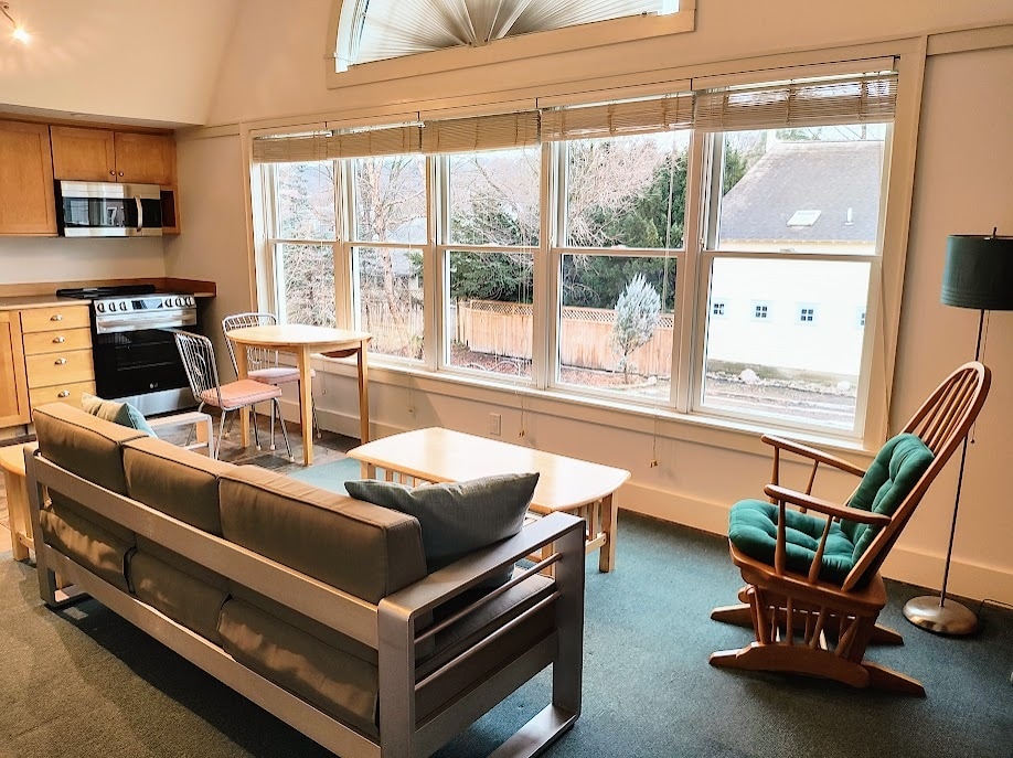 Open great room comprising kitchen, dining and living areas - 411 N Geneva St