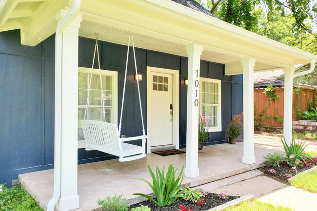 Front porch with swing - 1010 W Chestnut St