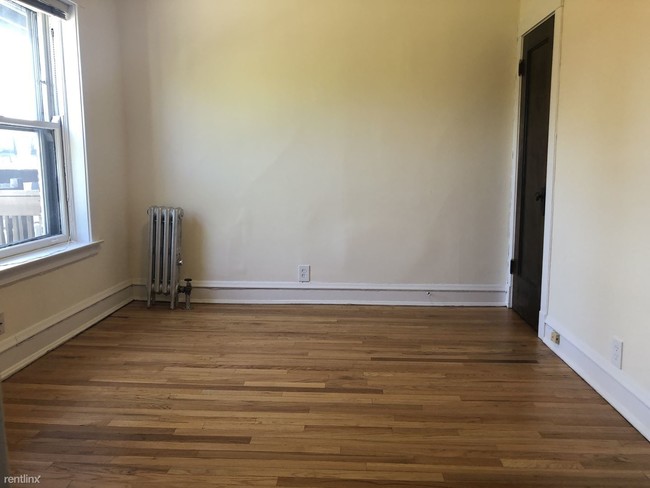 Foto del edificio - 7066 N Ashland Blvd