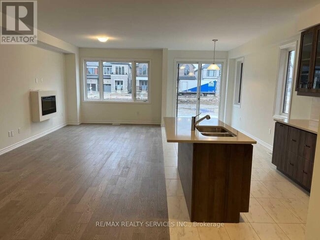 Photo du bâtiment - 40 Spinland St