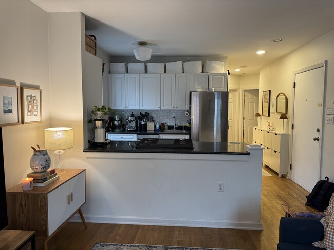 View into kitchen from Living Room - 93 Erie St