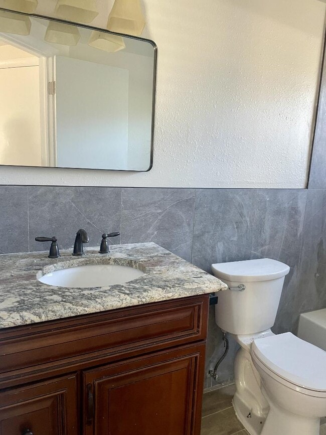 Building Photo - 1210 E 138th Ave