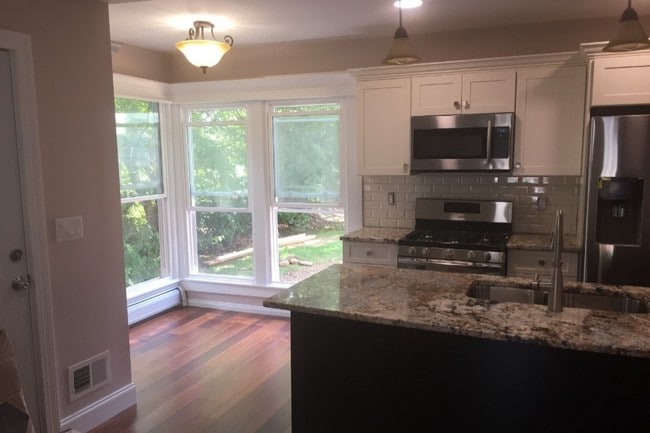 Breakfast nook with floor length windows. - 137 Walnut St