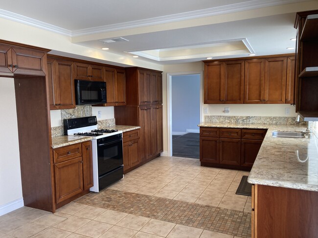 Open Kitchen with granite countertops - 10623 La Vine St.