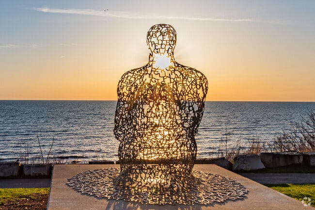 Atwater Park's sculpture at sunrise brings a zen ambiance.