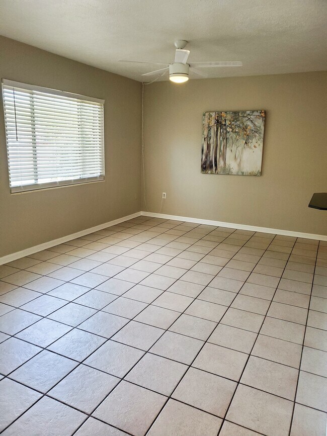 Family room with large picture window - 3316 Clark Rd
