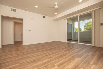 3x2 Living Room w/ Patio View - Mossdale Landing
