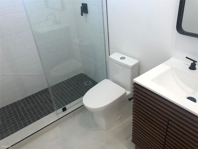 Foto del edificio - 3 br, 2 bath House - 5447 NW 4th Ave