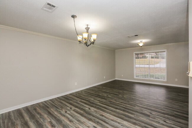 Building Photo - Charming 4-Bedroom, 2-Bathroom Brick Home ...