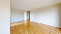 This well-designed apartment offers 1110 square feet of comfortable living space on a single floor. The layout includes three bedrooms, two bathrooms, a living room, kitchen, and hallway. The primary bedroom is generously sized at 200 square feet, providing ample space for relaxation.

The interior is characterized by its bright and airy ambiance, thanks to large windows that allow natural light to flood the rooms. Gleaming hardwood floors extend throughout the living areas and bedrooms, adding warmth and elegance to the space. The modern kitchen features white cabinetry, a double sink, and a window offering views while preparing meals.

Bathrooms are equipped with standard fixtures, including a bathtub in at least one of them. The apartment's neutral color palette creates a clean, contemporary feel that serves as a blank canvas for personal decor preferences.

Storage solutions are integrated into the design, with built-in closets in the bedrooms. The property is part of a larger residential complex, likely a high-rise building, situated in a developed area of Toronto. The location at 2085-2101 Islington Ave offers convenient urban living with nearby amenities and transportation options.