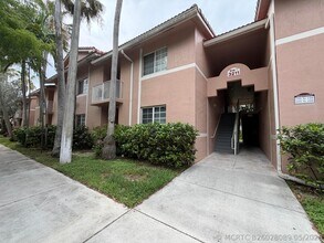 Building Photo - 3211 Sabal Palm Manor