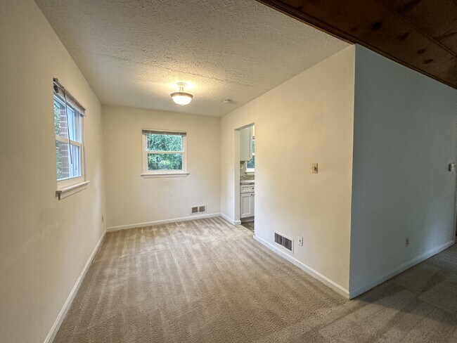 Building Photo - This classic brick rambler, located just around the corner from the West Falls Church Metro Stati...