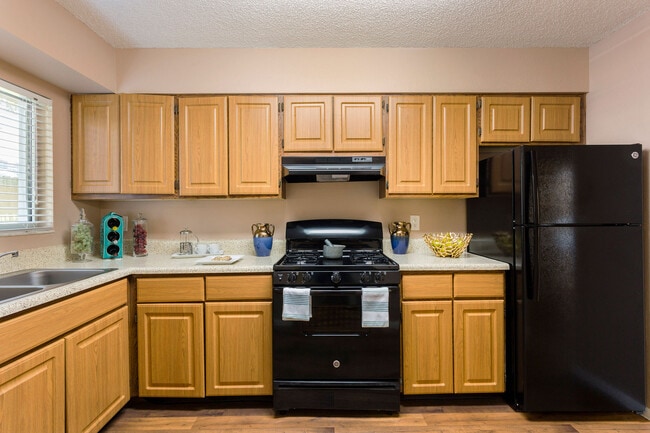 Kitchen (cabinets & appliances vary) - Westwood Suites