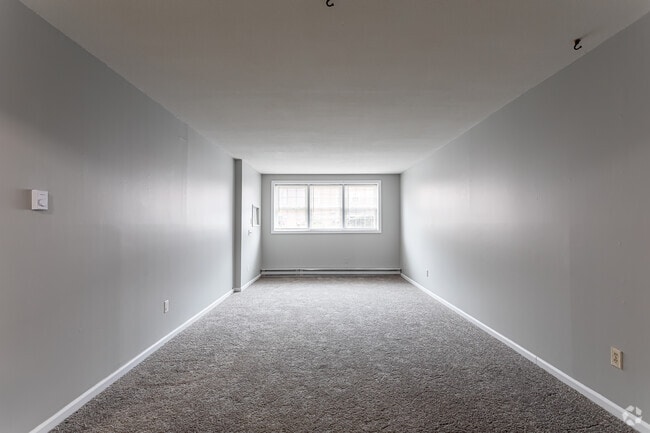 2BR, 1BA- Living Room - Omega Estates