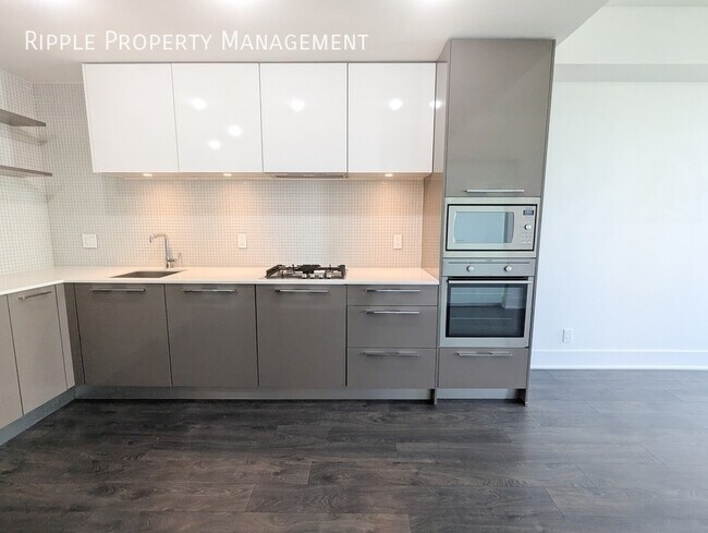 Photo du bâtiment - AMAZING 1 BED+DEN/ 1 BATH CONDO IN THE HEART OF DOWNTOWN | AC AVAILABLE
