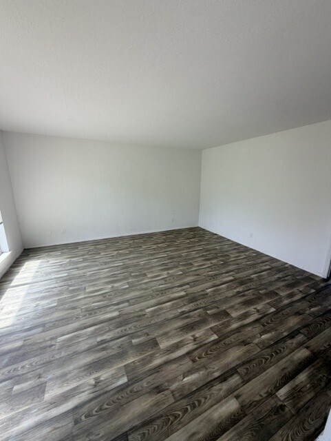 Living Room- Renovated Unit - Cimarron Apartments