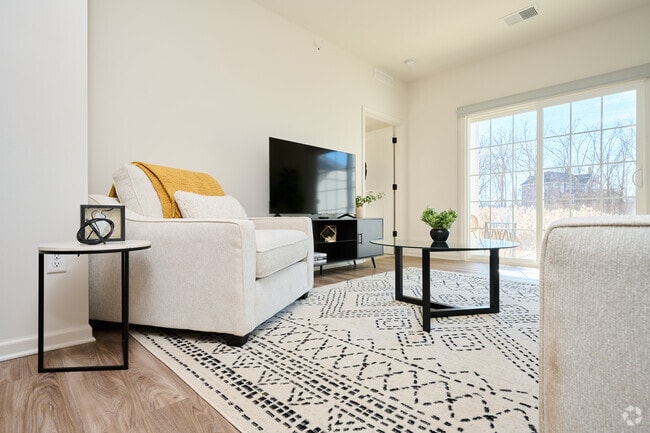 Floor Plan A - 2 BR, 2 BA - 1100 SF. Living room. - Genesee Pointe Apartments